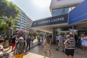 People walk on the street at Cannes Lions